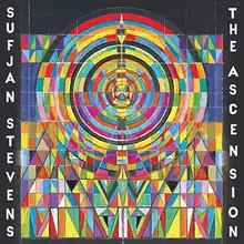 An elaborate and colorful pattern like a stained glass window making a circle in the center and top of the image with the album title and artist name running along the side in white text on black bands