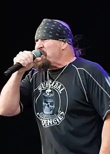 Muir performing in 2018