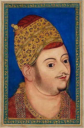 Deccan painting, Sultan Ibrahim Adil Shah II of Bijapur, c. 1590.  A three-quarter view which gives a powerful and lively impression of the sitter, despite lacking both Mughal precision, and very coherent modelling of the surfaces.