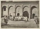 1922 photo showing the sultan in the Inner Mechouar, returning from prayers at the Great Mosque of Fes el-Jdid which was directly connected to the palace