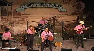 Lesa Cormier and the Sundown Playboys at the Liberty Theater in 2003.  All members are wearing pink.