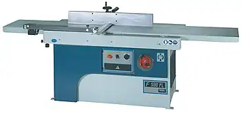 Planer, or jointer, with a standard vertical metal fence.