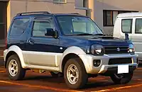 Jimny Sierra (JB43; 2012 facelift) with front mesh grille and two-tone exterior color