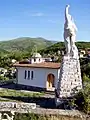 The chapel of St Dimitar and the monument on the hill.