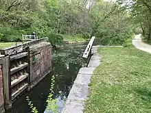 canal lock on left and towpath on right