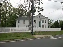 The historic Swezey-Avey House on the southeast bank of Upper Yaphank Lake