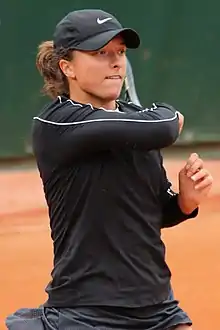 Image 45Iga Świątek, the 2023 women's singles champion. It was her fourth major title and her third at the French Open. (from French Open)