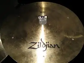 Rivets in a swish cymbal modify its sound