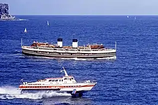 South Steyne and hydrofoil Dee Why passing North Head, 1970