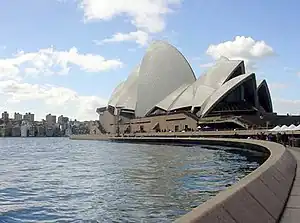 Image 3Sydney Opera HousePhoto credit: ChmouelThe Sydney Opera House in Sydney, New South Wales, Australia.Situated on Bennelong Point at Sydney Harbour, the Sydney Opera House is one of the most distinctive and famous 20th-century buildings, and one of the most famous performing arts venues in the world.More selected pictures