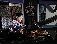 Image 19A Tboli woman weaving t'nalak from South Cotabato. (from Culture of the Philippines)