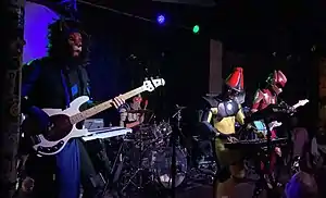 TWRP performing in Tampa in March 2020. From left to right: Commander Meouch, Havve Hogan, Doctor Sung, and Lord Phobos.