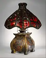 Table lamp, with glass and metal shade by Tiffany & Co., by 1902.