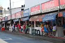 Taco stands along a street in Petatlán, Guerrero, Mexico