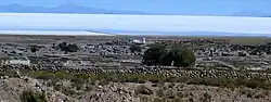 The village of Tahua with the Salar de Uyuni in the background