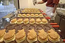 Taiyaki, literally "baked sea bream," is a Japanese fish-shaped cake.