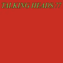 A red cover with "TALKING HEADS: 77" written at the top in green