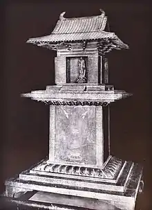 A black and white photograph of the Tamamushi Shrine