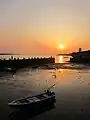 The sunset in front of the Long Pier of Tamsui