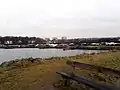 Winter scene. View towards the cove with beached boats