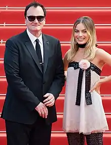 Robbie with Once Upon a Time in Hollywood director Quentin Tarantino at the 2019 Cannes Film Festival
