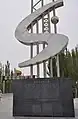The monument commemorating the completion of the Highway, on the north end (in Luntai County)