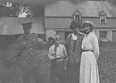 Photograph of Margery with Bryn at Tatsfield in 1917