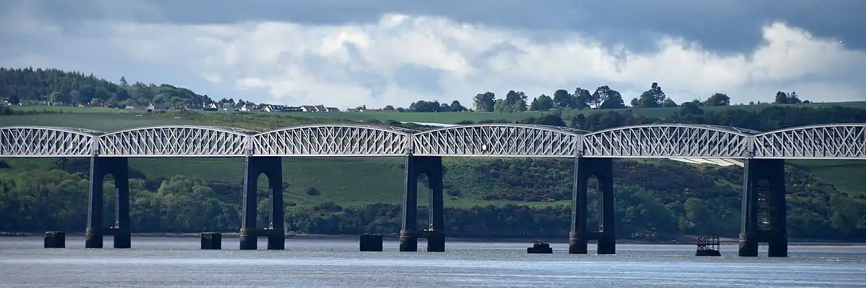 Northern segment of the second Tay Bridge, showing stumps of the original bridge's piers poking above the Tay
