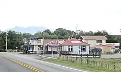 Te Uku Four Square and Roast Office with Mount Karioi in the background