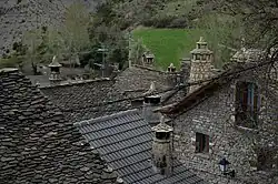 Traditional rooftops and chimneys in the Village of Borau.