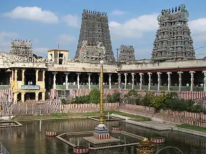 Meenakshi temple gopura and water pool
