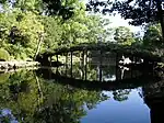 Rustic bridge at Tensha-en garden in Uwajima (1866)