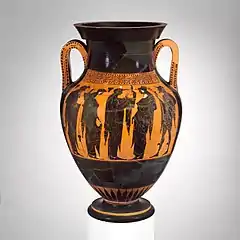 Leto on an ancient vase between Apollo and Hermes.