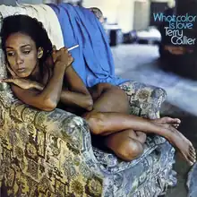 An evidently nude black woman curled up on a chair with the album title and artist written in light blue off to the corner
