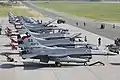 Czech Alcas and U.S. F-16's sit side by side on the ramp at Caslav Air Base, Czech Republic.