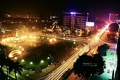 (from top left): Thanh Hóa Bridge, Lê Lợi Avenue; middle: Lê Lợi statue; bottom: Lam Son Square, Đông Sơn drums