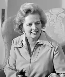 Thatcher sitting in a black-and-white photograph