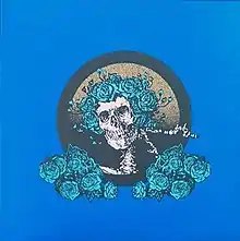 The skull and roses design, with blue roses and a blue background