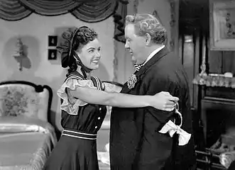 Ella Raines and Charles Laughton