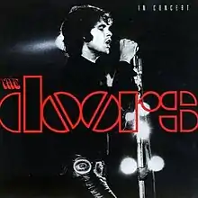 Picture of the Doors' singer Jim Morrison with the band's logo superimposed on top. In Concert is written at the top.