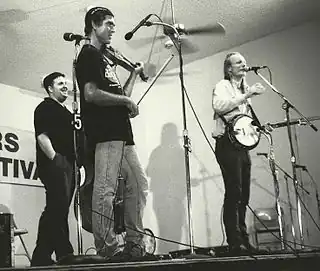 The Bad Livers on stage at Old Settlers' Park, Round Rock, Texas, October 7, 1994. Left to right: Mark Rubin, Ralph White, Danny Barnes.