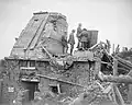 British officers in a captured German armoured observation post on a ruined house in St Eloi, 11 August 1917