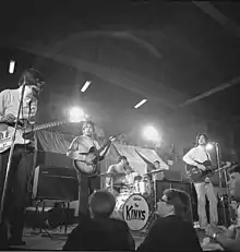 The Kinks performing onstage.