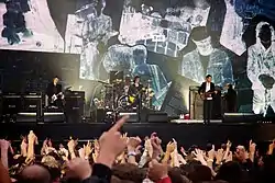 The Libertines performing in 2014 From left: Pete Doherty, Gary Powell (on drums), Carl Barât, John Hassell