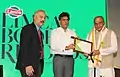 Dr. K Vishwanath receiving the award