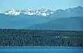 Mt. Deception (left), The Needles centered, Tyler Peak along right edge,as seen from near Port Townsend