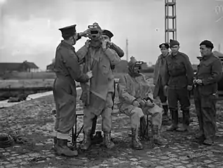 Royal Navy divers in Sladen suits during World War II