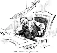 A political cartoon from Clifford Berryman following World War I, depicting a German delegate shakily signing a peace treaty as directed by the large hand of the Allied Powers, while a large sword bearing the inscription "Peace of Justice" hangs by a thread above him