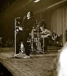 Wilson (right on drums) performing with Taste in 1970.