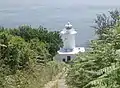 The steep access road down to the lighthouse